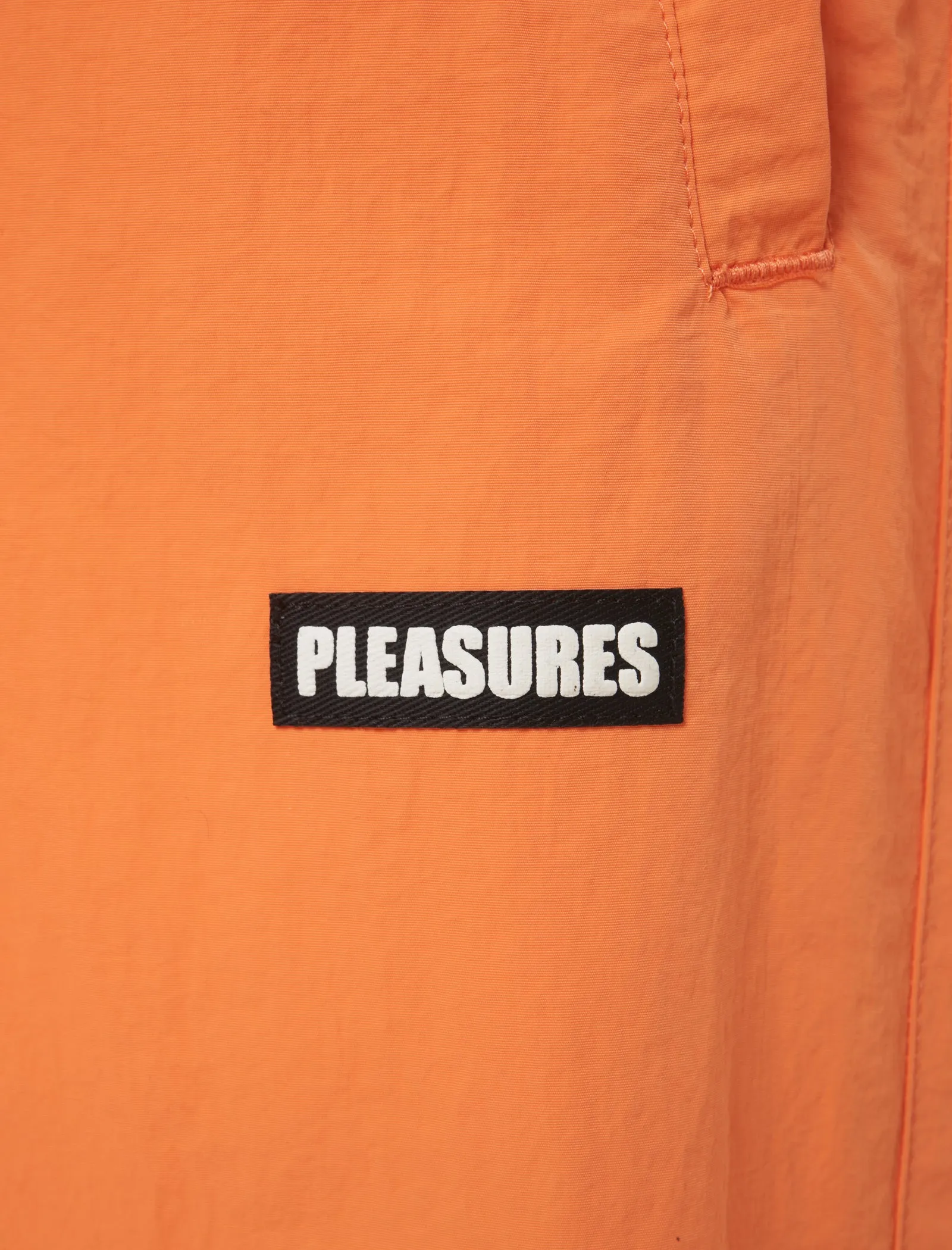 PLEASURES GAZE NYLON TRACKPANT   ORANGE